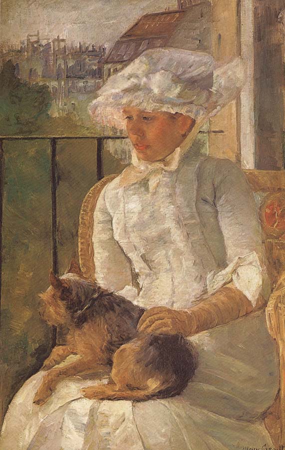Susan hoding the dog in balcony